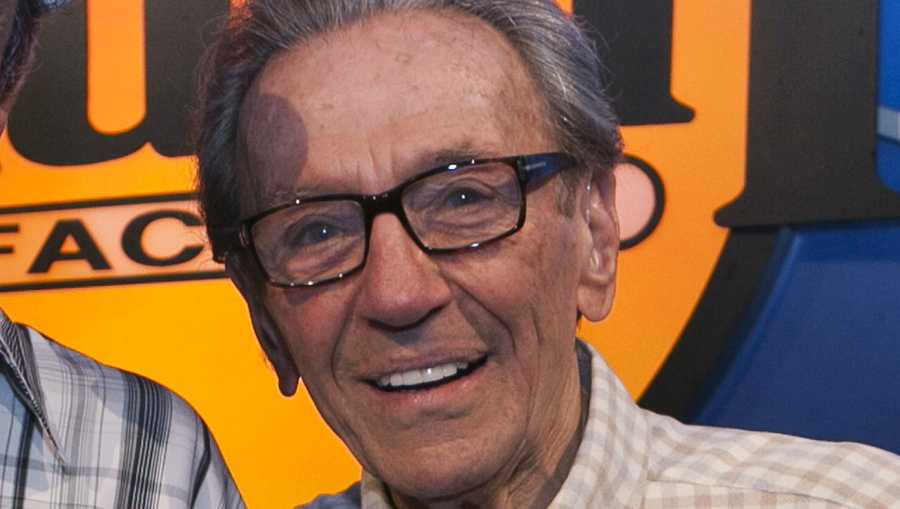 In this Aug. 5, 2011, file photo, Norm Crosby poses for a photo while expressing support for Jerry Lewis to be reinstated as host of the annual MDA Telethon, at the Laugh Factory in Los Angeles.