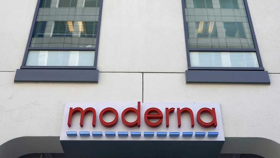 FILE - In this Dec. 15, 2020, file photo, a sign for Moderna, Inc. hangs on its headquarters in Cambridge, Mass. The U.S. is poised to give the green light as early as Friday, Dec. 18, to a second COVID-19 vaccine, a critical new weapon against the surging coronavirus. Doses of the vaccine developed by Moderna Inc. and the National Institutes of Health will give a much-needed boost to supplies as the biggest vaccination effort in the nation’s history continues. (AP Photo/Elise Amendola, File)