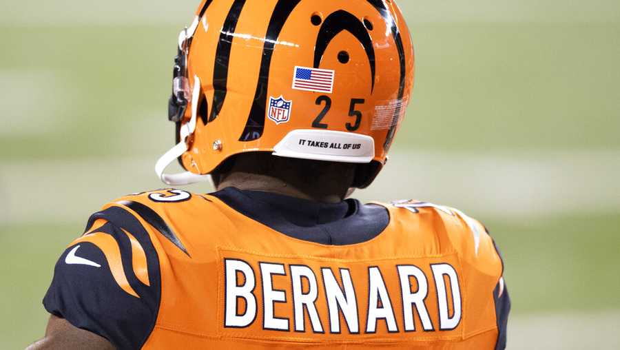 Cincinnati Bengals running back Giovani Bernard (25) wears an "It Takes All of Us" decal on his helmet prior to an NFL football game against the Pittsburgh Steelers, Monday, Dec. 21, 2020, in Cincinnati. (AP Photo/Emilee Chinn)