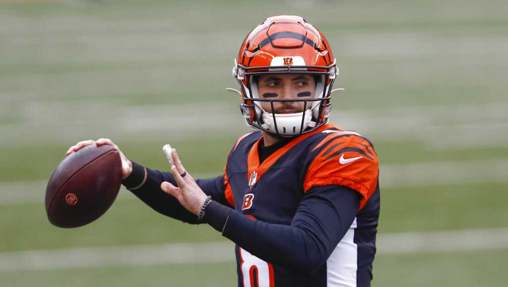 Brandon Allen of the Cincinnati Bengals warms up before the game