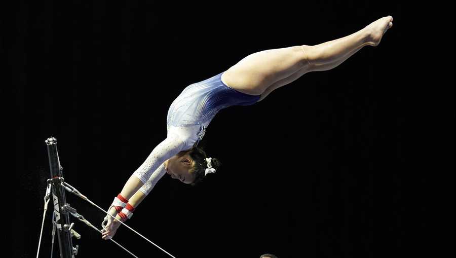 Emily Lee performs on the uneven bars during the Winter Cup gymnastics competition, Saturday, Feb. 27, 2021, in Indianapolis. (AP Photo/Darron Cummings)