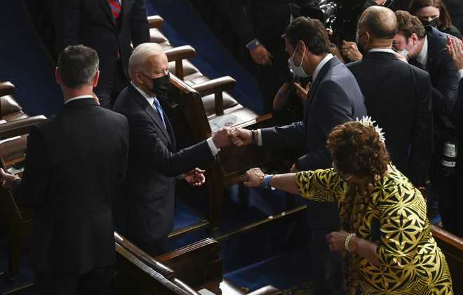 President&#x20;Joe&#x20;Biden&#x20;arrives&#x20;to&#x20;address&#x20;a&#x20;joint&#x20;session&#x20;of&#x20;Congress&#x20;Wednesday,&#x20;April&#x20;28,&#x20;2021,&#x20;in&#x20;the&#x20;House&#x20;Chamber&#x20;at&#x20;the&#x20;U.S.&#x20;Capitol&#x20;in&#x20;Washington.