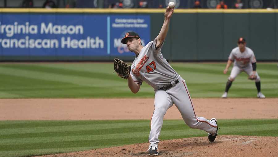 Baltimore Orioles starting pitcher John Means throws against the Seattle Mariners during the eighth inning of a baseball game, Wednesday, May 5, 2021, in Seattle. (AP Photo/Ted S. Warren)