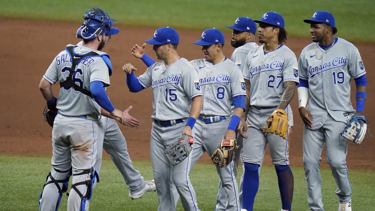 Kansas City Royals Brett Phillips jogs back to the dug out after