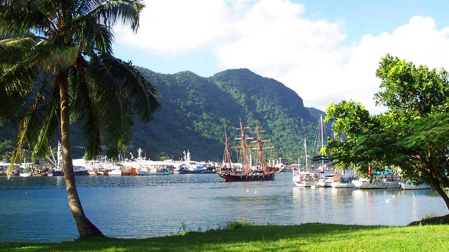 FILE - This July 2002 file photo shows a sailing ship in the harbor at Pago Pago, American Samoa. A federal appeals court ruling says U.S. citizenship shouldn&apos;t be imposed on those born in American Samoa. The decision reverses a lower court ruling that sided with three people from American Samoa who lived in Utah. They sued to be recognized as citizens. (AP Photo/David Briscoe, File)