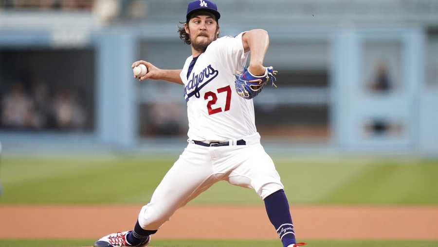 Los Angeles Dodgers starting pitcher Trevor Bauer throws against the San Francisco Giants during the first inning of a baseball game, Monday, June 28, 2021, in Los Angeles. (AP Photo/Jae C. Hong)