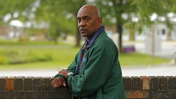 Crosby Smith, care provider at Ludeman Developmental Center. (AP Photo/Shafkat Anowar)