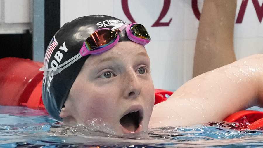Lydia Jacoby, of the United States, reacts after winning the final of the women's 100-meter breaststroke at the 2020 Summer Olympics, Tuesday, July 27, 2021, in Tokyo, Japan.