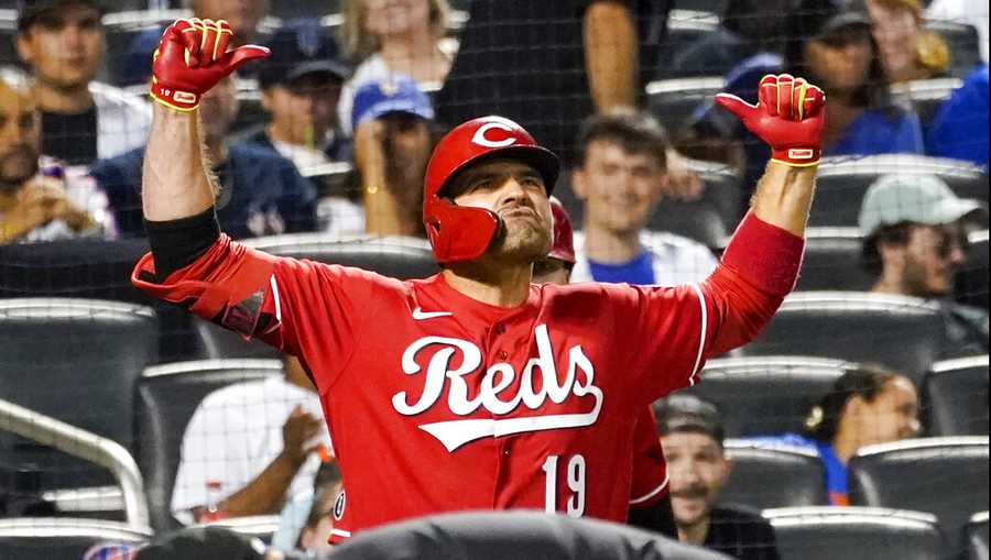 Cincinnati Reds' Joey Votto celebrates his solo home run in the sixth inning of the baseball game against the New York Mets, Friday, July 30, 2021, in New York. (AP Photo/Mary Altaffer)