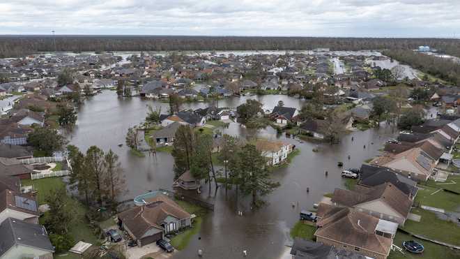 Flooded&#x20;streets&#x20;and&#x20;homes&#x20;are&#x20;shown&#x20;in&#x20;the&#x20;Spring&#x20;Meadow&#x20;subdivision&#x20;in&#x20;LaPlace,&#x20;La.,&#x20;after&#x20;Hurricane&#x20;Ida&#x20;moved&#x20;through&#x20;Monday,&#x20;Aug.&#x20;30,&#x20;2021.