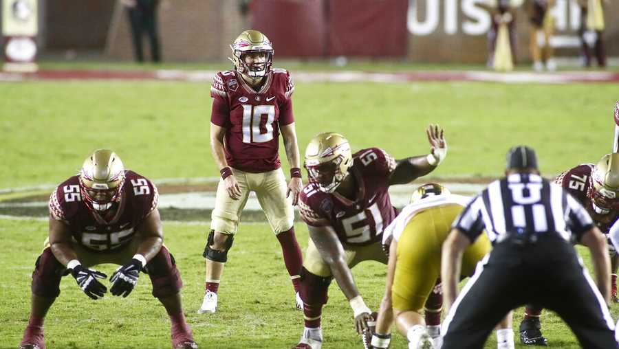 Florida State quarterback McKenzie Milton (10) waits for the snap in overtime of an NCAA college football game against Notre Dame Sunday, Sept. 5, 2021, in Tallahassee, Fla. Notre Dame won 41-38. (AP Photo/Phil Sears)