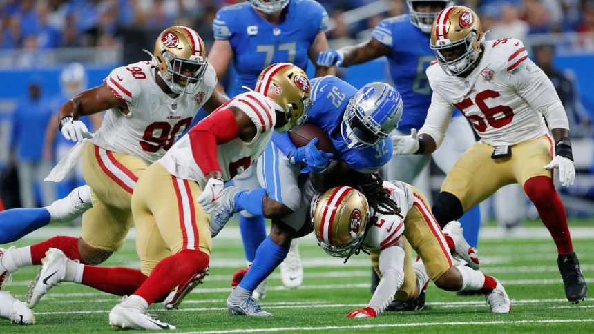 49ers build 28-point lead, hold on for 41-33 win over Lions