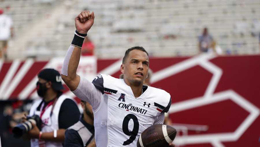 Ridder helps Bearcats rally for 38-24 win at Indiana
