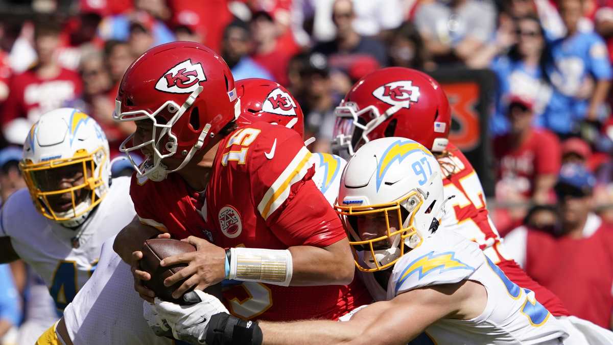 Kansas City Chiefs quarterback Patrick Mahomes runs the ball during the  second half of an NFL football game against the Los Angeles Chargers  Sunday, Sept. 26, 2021, in Kansas City, Mo. (AP