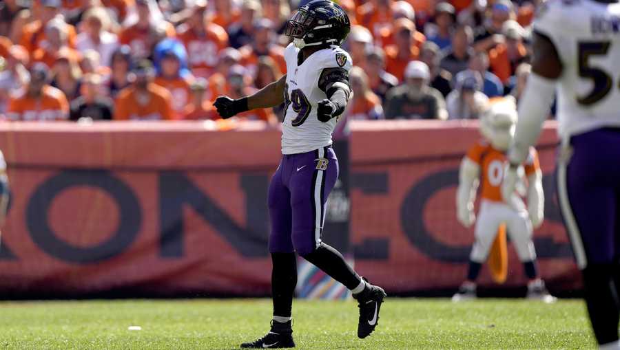 Baltimore Ravens linebacker Odafe Oweh (99) celebrates his sack against the Denver Broncos during the first half of an NFL football game, Sunday, Oct. 3, 2021, in Denver. (AP Photo/David Zalubowski)