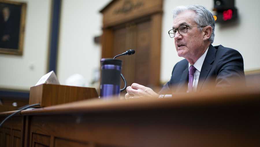 FILE - In this Sept. 30, 2021 file photo, Federal Reserve Chairman Jerome Powell testifies during a House Financial Services Committee hearing on Capitol Hill in Washington. Federal Reserve officials agreed at their last meeting that if the economy continued to improve, they could start reducing their monthly bond purchases as soon as next month and bring them to an end by the middle of 2022. The discussion was revealed in the minutes of the Fed’s Sept. 21-22 meeting, released Wednesday., Oct. 13.