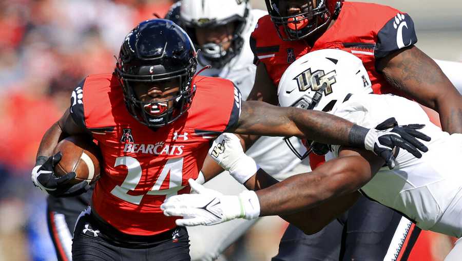 Jerome Ford's four TDs lead No. 3 Cincinnati over UCF 5621