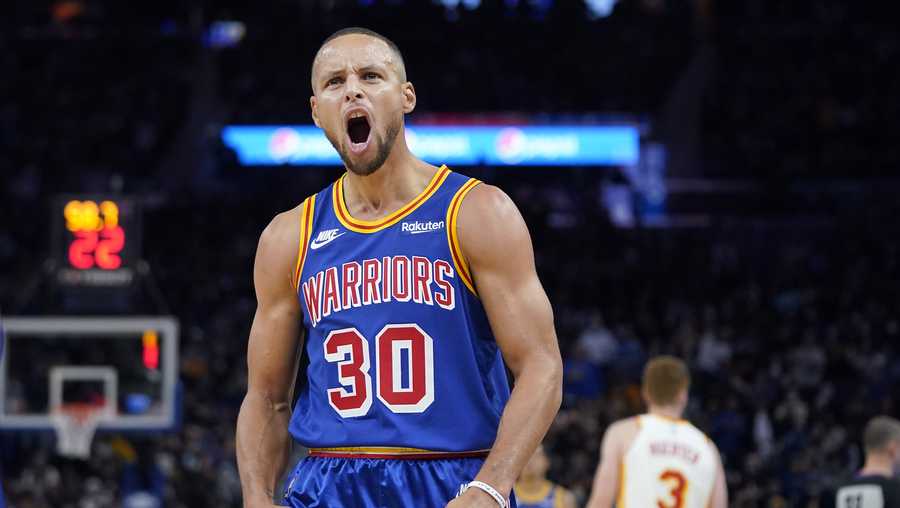 Golden State Warriors guard Stephen Curry (30) reacts toward fans during the second half of an NBA basketball game against the Atlanta Hawks in San Francisco, Monday, Nov. 8, 2021. (AP Photo/Jeff Chiu)