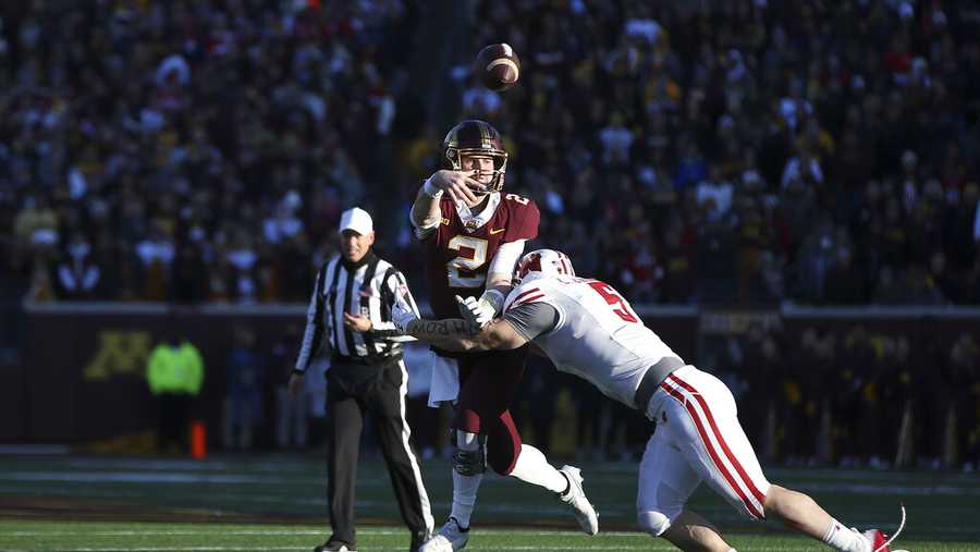 Minnesota quarterback Tanner Morgan (2) throws the ball during the first half of an NCAA college football game against Wisconsin, Saturday, Nov. 27, 2021, in Minneapolis. (AP Photo/Stacy Bengs)