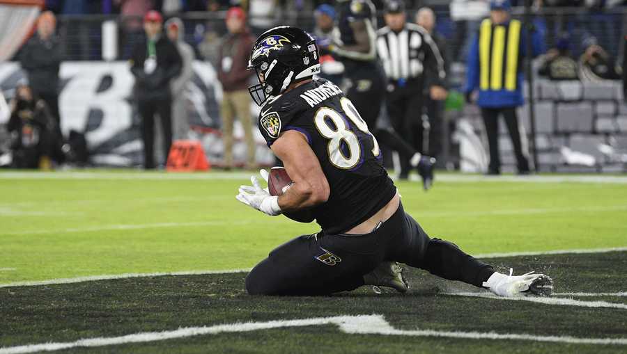 Baltimore Ravens tight end Mark Andrews catches a touchdown pass from quarterback Lamar Jackson against the Cleveland Browns during the second half of an NFL football game, Sunday, Nov. 28, 2021, in Baltimore. (AP Photo/Nick Wass)