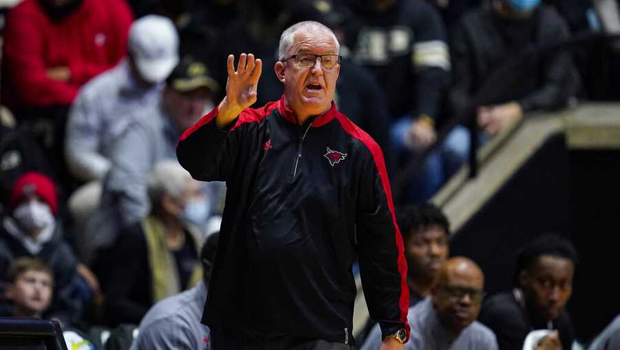 Omaha head coach Derrin Hansen gestures during the first half of an NCAA college basketball game against Purdue in West Lafayette, Ind., Friday, Nov. 26, 2021. (AP Photo/Michael Conroy)