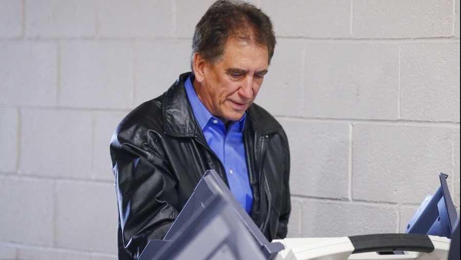 FILE - Rep. Jim Renacci, R-Ohio, votes at the Church of the Nazarene Tuesday, Nov. 6, 2018, in Wadsworth, Ohio. Renacci, a former Republican congressman who's challenging Ohio Gov. Mike DeWine in next year’s primary, said Thursday, Dec. 2, 2021, he has picked Joe Knopp, a Christian filmmaker who made a documentary about former President Donald Trump, to be his running mate. (AP Photo/Ron Schwane, File)