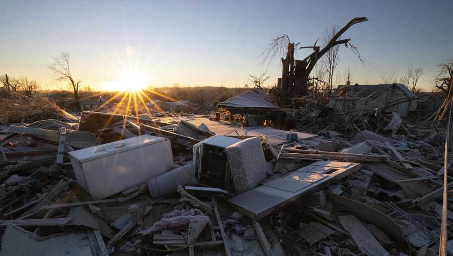 The remains of a house after a tornado in Dawson Springs, Ky., Sunday, Dec. 12, 2021.  A monstrous tornado, carving a track that could rival the longest on record, ripped across the middle of the U.S. on Friday. (AP Photo/Michael Clubb)
