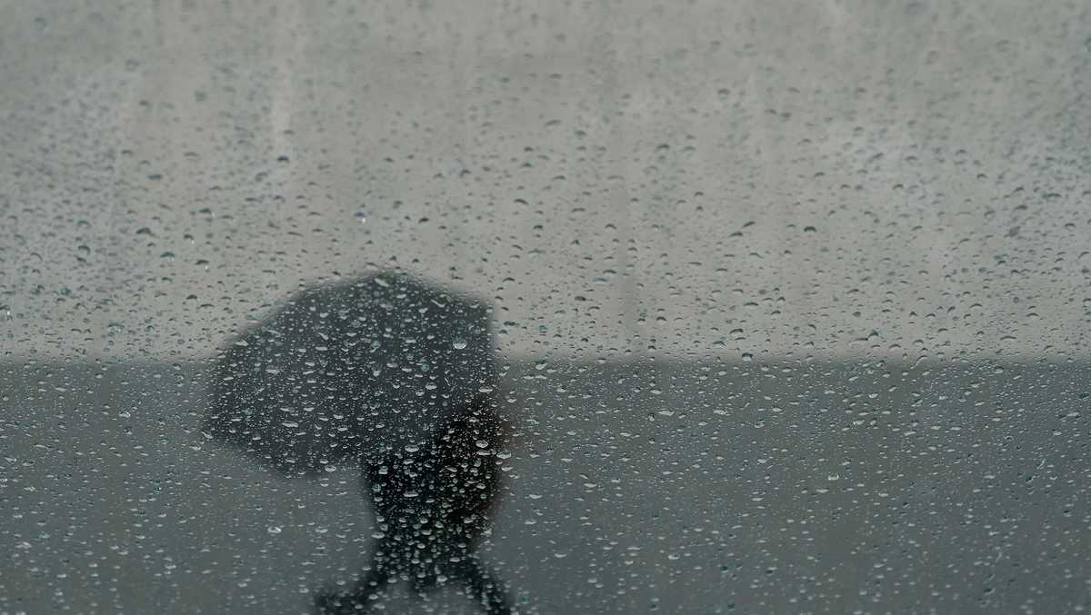 2 dead in submerged car as California storm worries spread