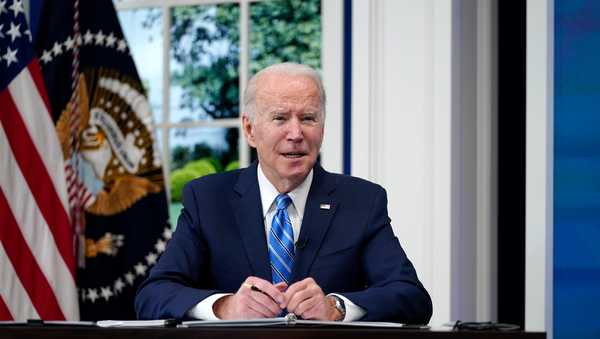 President Joe Biden participates in the White House COVID-19 Response Team's regular call with the National Governors Association in the South Court Auditorium in the Eisenhower Executive Office Building on the White House Campus, Monday, Dec. 27, 2021, in Washington. (AP Photo/Carolyn Kaster)