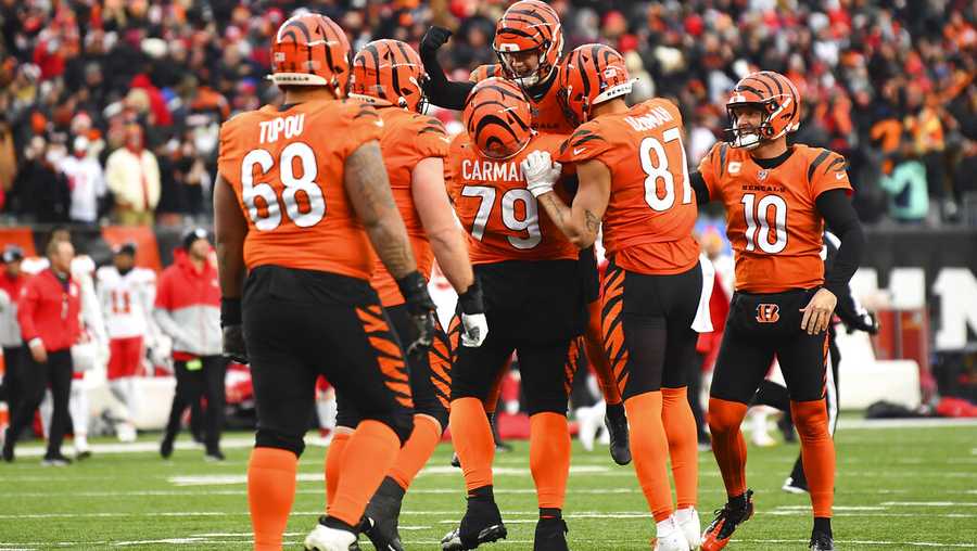 Cincinnati Bengals kicker Evan McPherson (2) celebrates with teammates after kicking the game winning field goal in the second half to beat the Kansas City Chiefs 34-31 during an NFL football game, Sunday, Jan. 2, 2022, in Cincinnati. (AP Photo/Emilee Chinn)