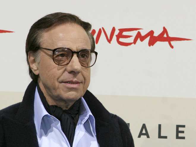 FILE&#x20;-&#x20;U.S.&#x20;film&#x20;director,&#x20;writer&#x20;and&#x20;actor&#x20;Peter&#x20;Bogdanovich&#x20;poses&#x20;during&#x20;a&#x20;photo&#x20;call&#x20;for&#x20;the&#x20;presentation&#x20;of&#x20;the&#x20;movie&#x20;&quot;The&#x20;Dukes&quot;&#x20;at&#x20;the&#x20;Rome&#x20;Film&#x20;Festival&#x20;in&#x20;Rome&#x20;on&#x20;Oct.&#x20;23,&#x20;2007.&#x20;&#x20;Bogdanovich,&#x20;the&#x20;Oscar-nominated&#x20;director&#x20;of&#x20;&quot;The&#x20;Last&#x20;Picture&#x20;Show,&quot;&#x20;and&#x20;&quot;Paper&#x20;Moon,&quot;&#x20;died&#x20;Thursday,&#x20;Jan.&#x20;6,&#x20;2022&#x20;at&#x20;his&#x20;home&#x20;in&#x20;Los&#x20;Angeles.&#x20;He&#x20;was&#x20;82.&#x20;&#x20;&#x28;AP&#x20;Photo&#x2F;Sandro&#x20;Pace,&#x20;File&#x29;