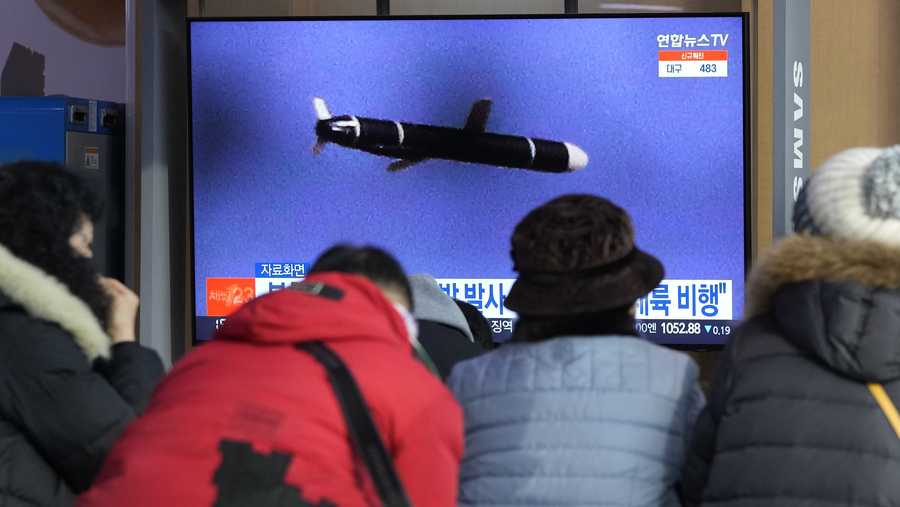 TV showing a file image of North Korea's missile launch