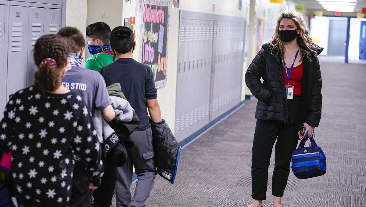 Schools seek volunteer teachers amid COVID staffing crunch