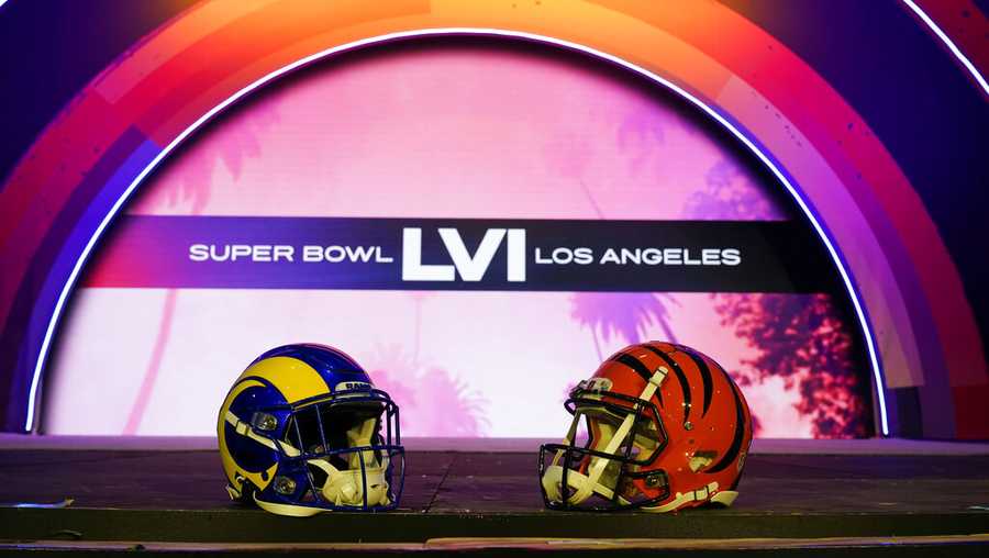 Los Angeles Rams and Cincinnati Bengals helmets are placed on a stage inside the NFL Experience, an interactive fan show, Friday, Feb. 4, 2022, at the Los Angeles Convention Center in Los Angeles. The Los Angeles Rams play the Cincinnati Bengals in the Super Bowl NFL football game on Sunday, Jan. 13. in Inglewood, Calif. (AP Photo/Marcio Jose Sanchez)