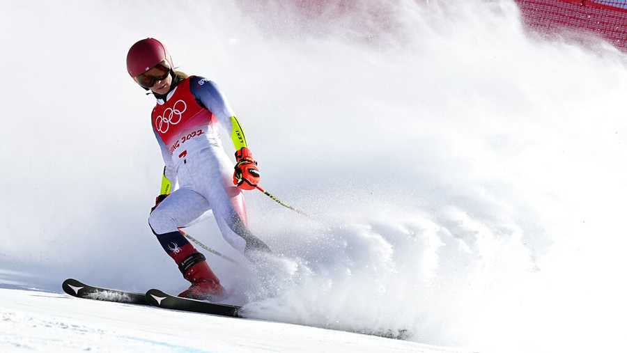 Mikaela Shiffrin of United States looks down after skiing off course during the first run of the women&apos;s giant slalom at the 2022 Winter Olympics, Monday, Feb. 7, 2022, in the Yanqing district of Beijing. (AP Photo/Robert F. Bukaty)