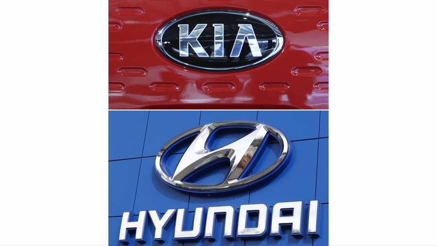 This combination of file photos shows the logo of Kia Motors Dec. 13, 2017, in Seoul, South Korea, top, and Hyundai logo April 15, 2018, in the south Denver suburb of Littleton, Colo., bottom.