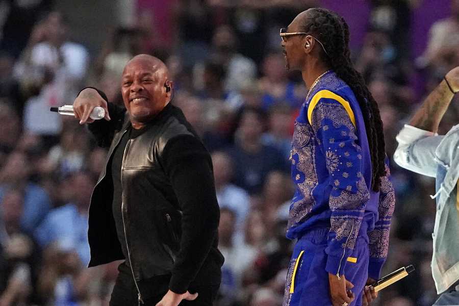 Dr. Dre, left, and Snoop Dogg perform during halftime of the NFL Super Bowl 56 football game between the Los Angeles Rams and the Cincinnati Bengals, Sunday, Feb. 13, 2022, in Inglewood, Calif. (AP Photo/Tony Gutierrez)