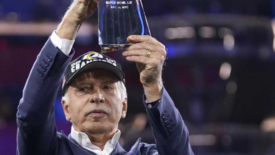 Los Angeles Rams owner Stan Kroenke holds up the Lombardi trophy after Rams defeated the Cincinnati Bengals in the NFL Super Bowl 56 football game Sunday, Feb. 13, 2022, in Inglewood, Calif. (AP Photo/Marcio Jose Sanchez)