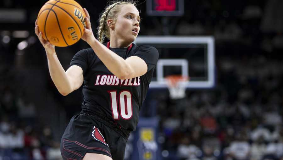 Louisville&apos;s Hailey Van Lith (10) looks to pass during an NCAA college basketball game against Notre Dame on Sunday, Feb. 27, 2022, in South Bend, Ind. (AP Photo/Robert Franklin)