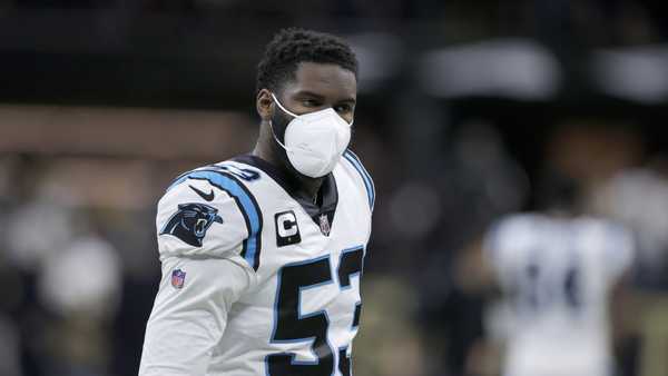 FILE - Carolina Panthers defensive end Brian Burns (53) wears a mask as he warms up before an NFL football game against the New Orleans Saints in New Orleans, Sunday, Jan. 2, 2022. The NFL has suspended all aspects of its COVID-19 protocols, citing recent trends showing that the spread of the coronavirus is declining. In an agreement with the players' association, the league sent a memo to the 32 teams Thursday, March 3, 2022, in which it mentioned 