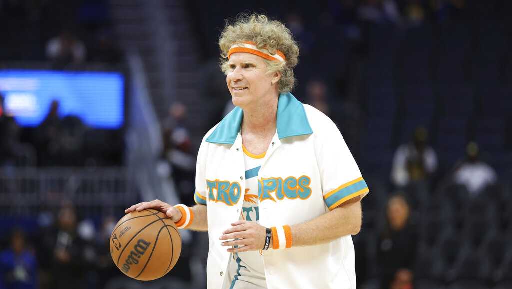 In “Semi-Pro” costume, actor Will Ferrell warms up with Klay