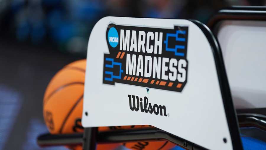 March Madness logo on a basketball rack before a First Four game between Howard and Incarnate Word in the NCAA women's college basketball tournament Wednesday, March 16, 2022 in Columbia, S.C. Howard won 55-51. (AP Photo/Sean Rayford)