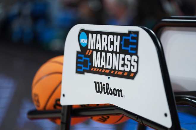 March Madness logo on a basketball rack before a game in the NCAA college basketball tournament