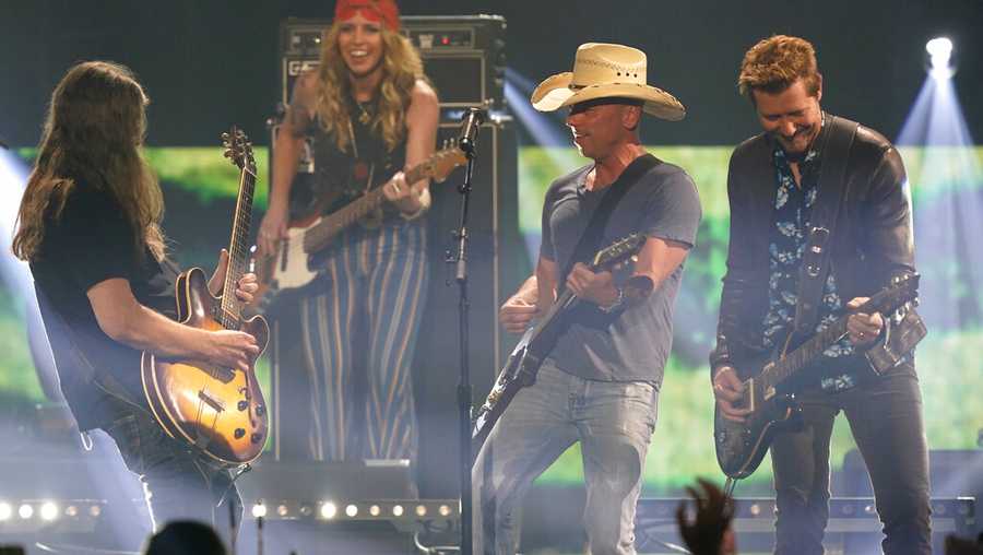 Kenny Chesney performs "Beer In Mexico" at the CMT Music Awards on Monday, April 11, 2022, at the Municipal Auditorium in Nashville, Tenn. (AP Photo/Mark Humphrey)