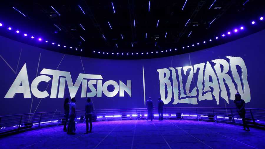 FILE - The Activision Blizzard Booth is shown on June 13, 2013, during the Electronic Entertainment Expo in Los Angeles. A top California state civil rights lawyer who was pursuing a discrimination case against the video game giant has been fired, and her colleague has quit in protest. Janette Wipper was chief counsel for the state Department of Fair Employment and Housing but Wednesday, April 13, 2022, was her last day. Her attorney says another department attorney involved in the case, Melanie Proctor, quit Wednesday.  (AP Photo/Jae C. Hong, File)