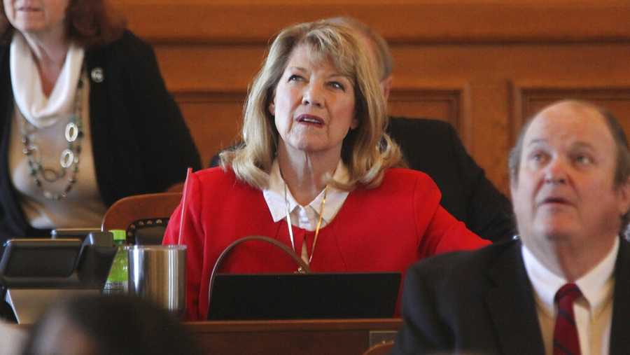 Kansas state Rep. Cheryl Helmer, center, R-Mulvane, watches one of the House&apos;s electronic tally board during a vote, Tuesday, April 26, 2022, at the Statehouse in Topeka, Kan. Helmer has complained publicly about having to share women&apos;s restrooms with a transgender colleague. (AP Photo/John Hanna)