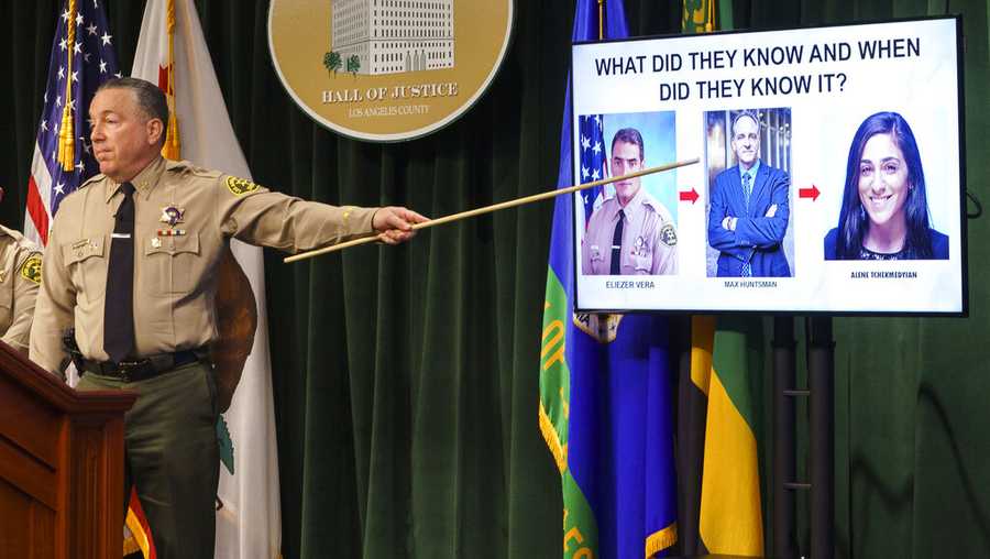 Los Angeles County Sheriff Alex Villanueva gestures during a news conference, Tuesday, April 26, 2022, in Los Angeles. Villanueva disputed allegations that he orchestrated the coverup of an incident where a deputy knelt on a handcuffed inmate&apos;s head last year. Villanueva, who oversees the nation&apos;s largest sheriff&apos;s department, also indicated that an Los Angeles Times reporter is under criminal investigation after she first reported the incident with the inmate. (AP Photo/Damian Dovarganes)