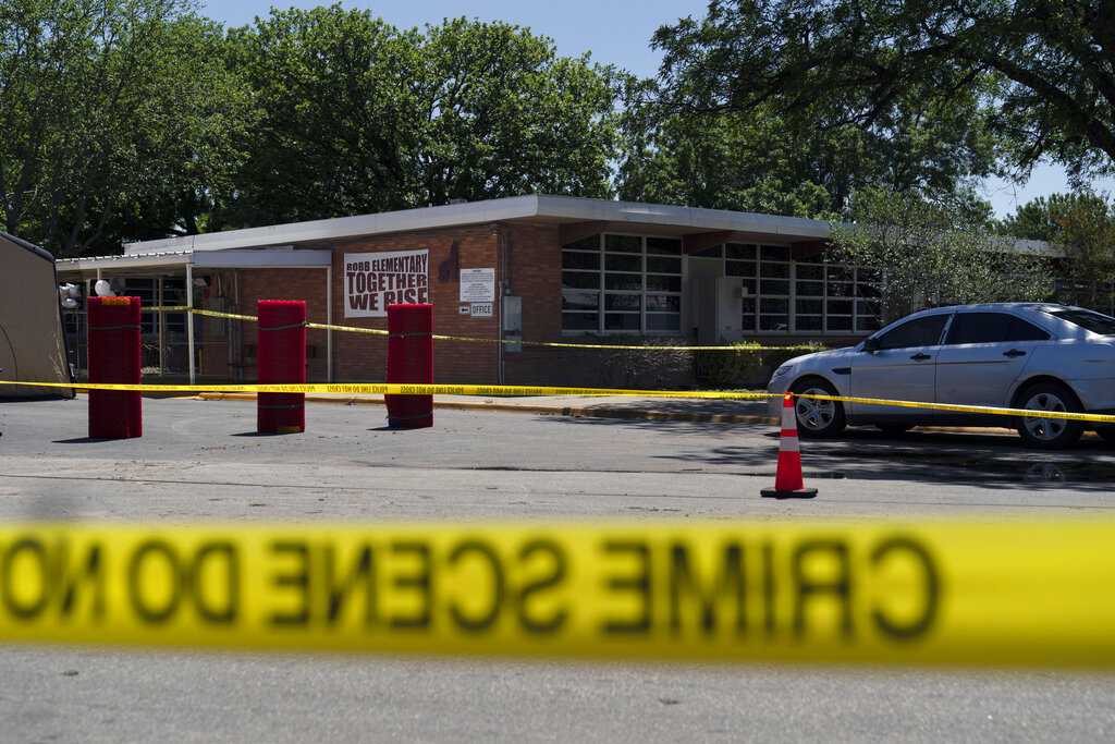 Onlookers urged police to charge into Texas elementary school soon after shooting began