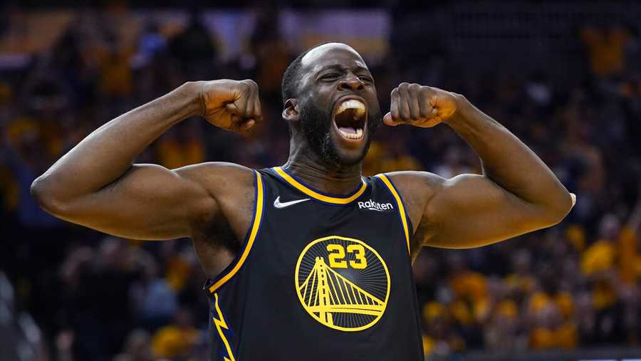 Golden State Warriors forward Draymond Green celebrates after scoring against the Dallas Mavericks during the second half in Game 5 of the NBA basketball playoffs Western Conference finals in San Francisco, Thursday, May 26, 2022. (AP Photo/Jeff Chiu)