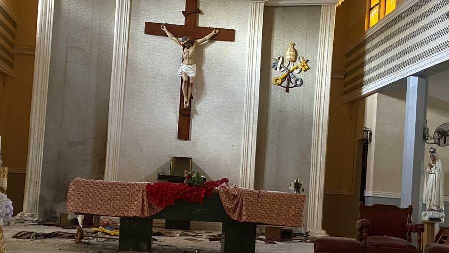 A view of the St. Francis Catholic Church in Owo Nigeria, Sunday, June 5, 2022. Lawmakers in southwestern Nigeria say more than 50 people are feared dead after gunmen opened fire and detonated explosives at a church. Ogunmolasuyi Oluwole with the Ondo State House of Assembly said the gunmen targeted the St Francis Catholic Church in Ondo state on Sunday morning just as the worshippers gathered for the weekly Mass. (AP Photo/Rahaman A Yusuf)